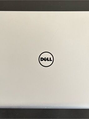 Dell Silver Aluminum Laptop with Black Logo